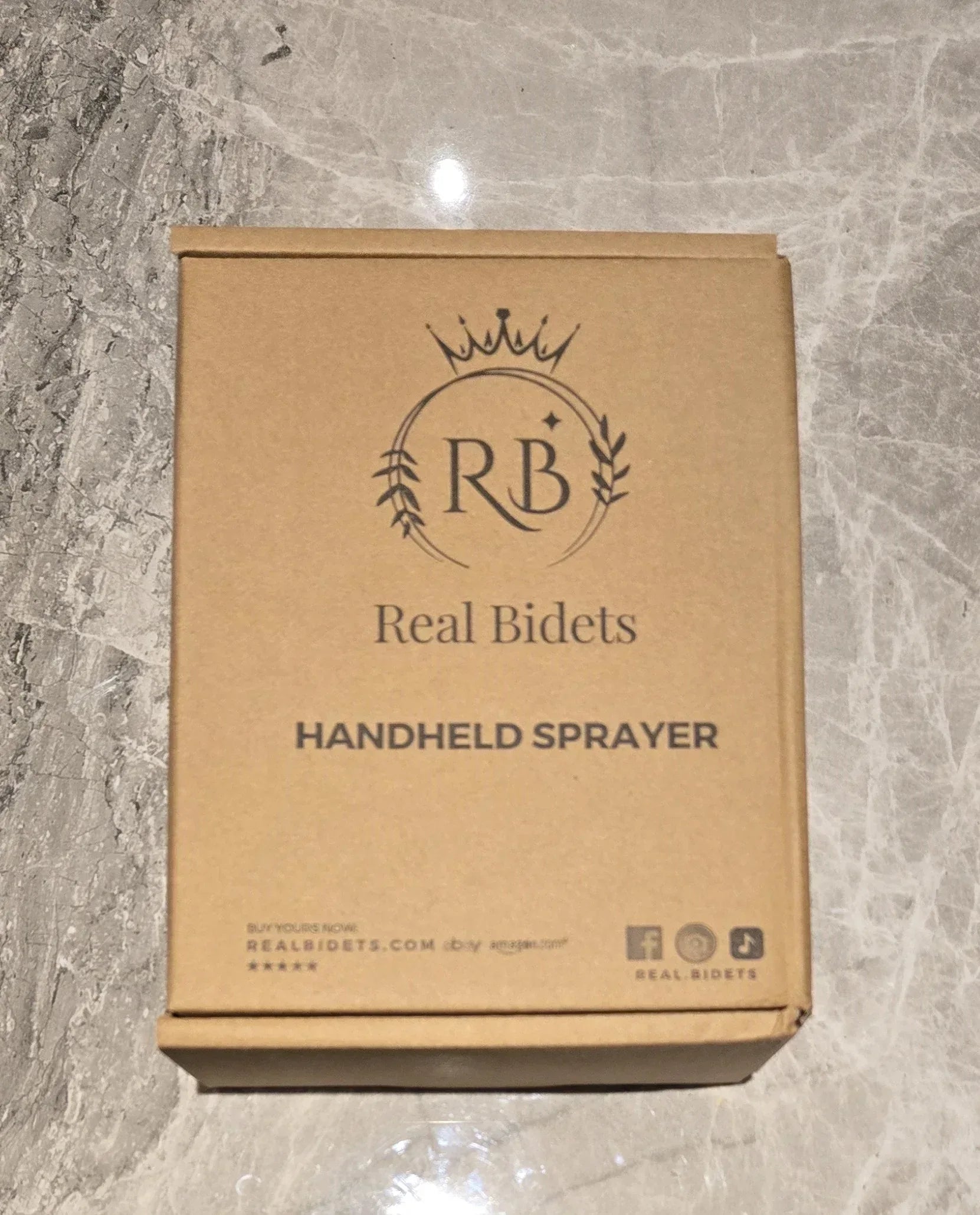Real Bidets kraft box packaging for handheld bidet kit