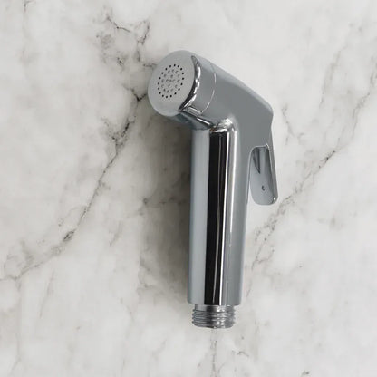 Front view of Real Bidets handheld sprayer on marble background